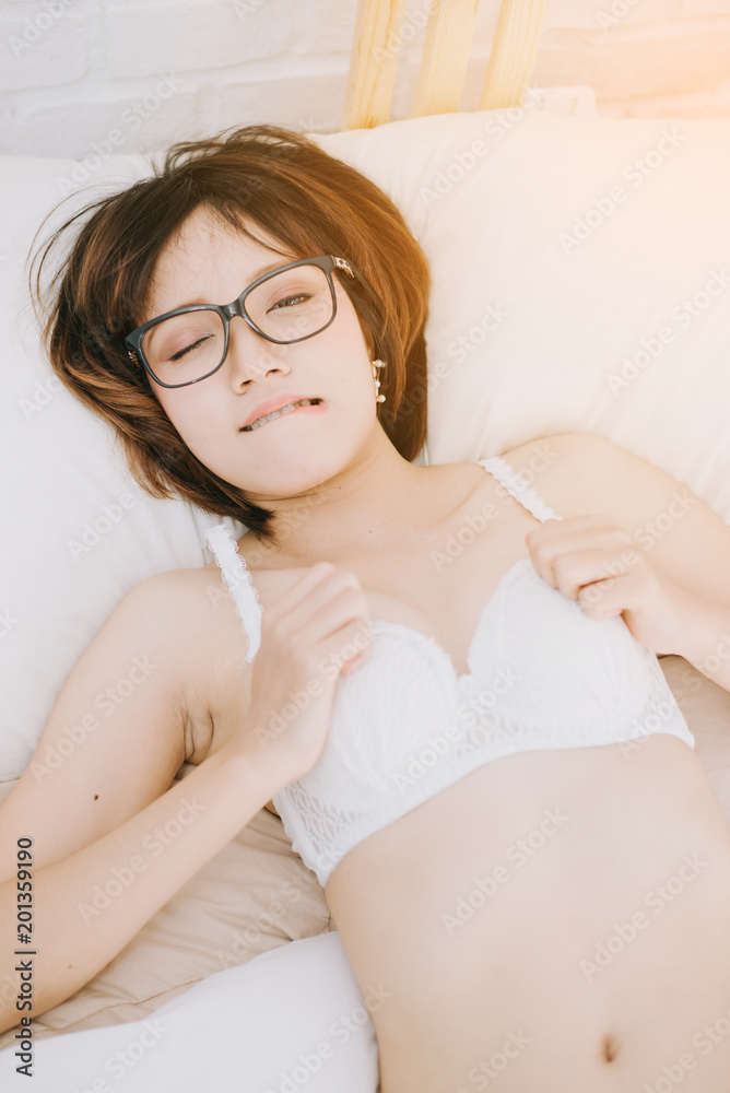 A very sexy asian girl wearing lingerie, posing very sexy. A very sexy asian girl wearing lingerie, posing very sexy.