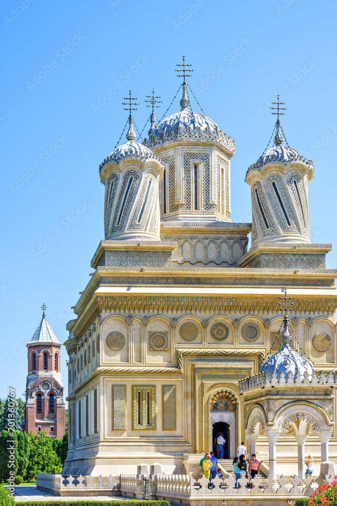 Daylight portrait view to monastery facade and domes