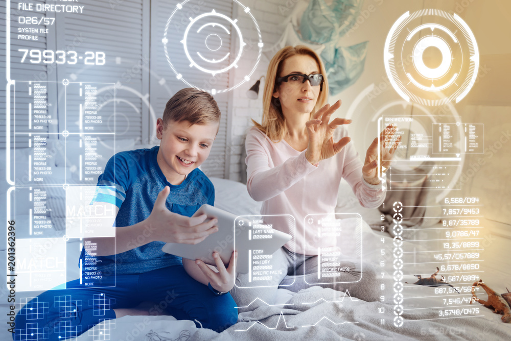 Exploring additional reality. Clever professional programmer touching a ...