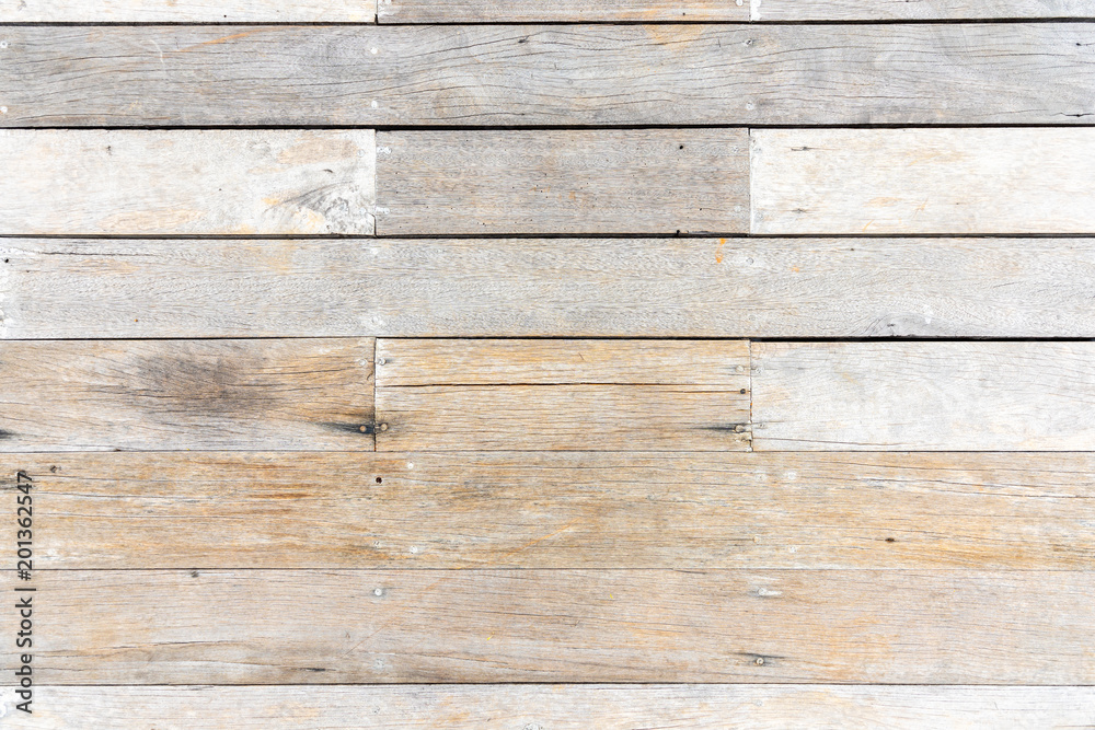 Fototapeta premium Design backdrop of Vintage old rustic weathered barn wood texture pattern background with knots and nail holes