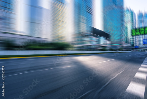 asphalt road with modern building in city © THINK b