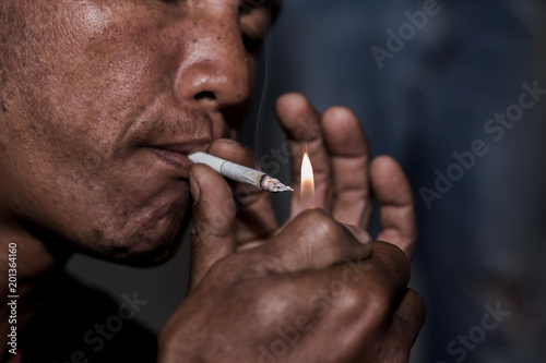 Man smoking image, human life-threatening concept,Drug paraphernalia