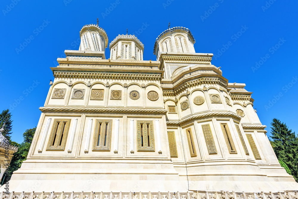 Daylight closeup view to monastery facade and domes