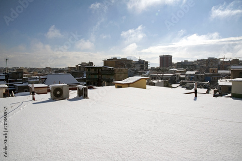 Buildings’ roofs covered with snow: an unexpected snowfall in south Italy
