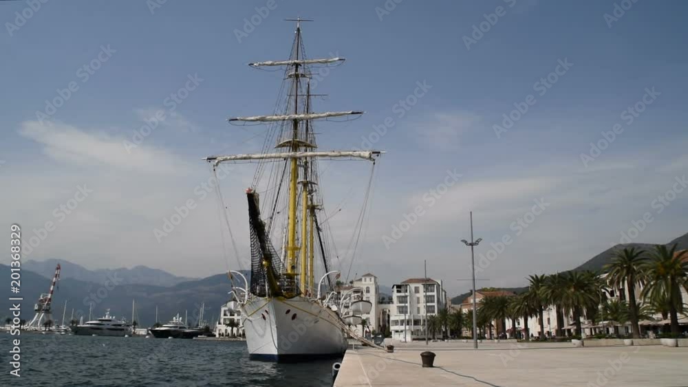 front side of moored sailboat in the port front side of moored sailboat in the port