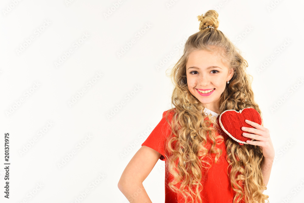 beautiful school age girl wearing red holding heart beautiful school age girl wearing red holding heart