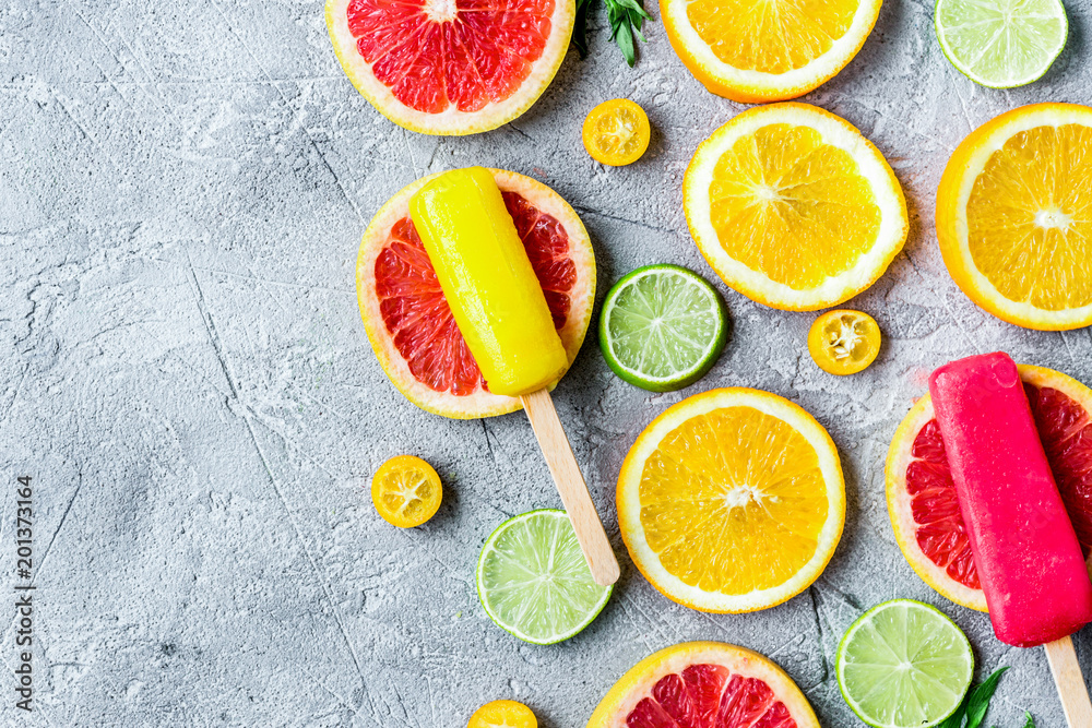 Orange icecream with fruits on table background top view mock-up Orange icecream with fruits on table background top view mock-up