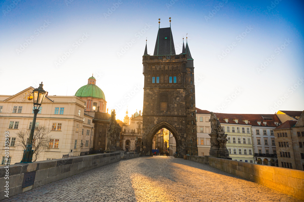 Charles Bridge without people at sunrise light in early morning