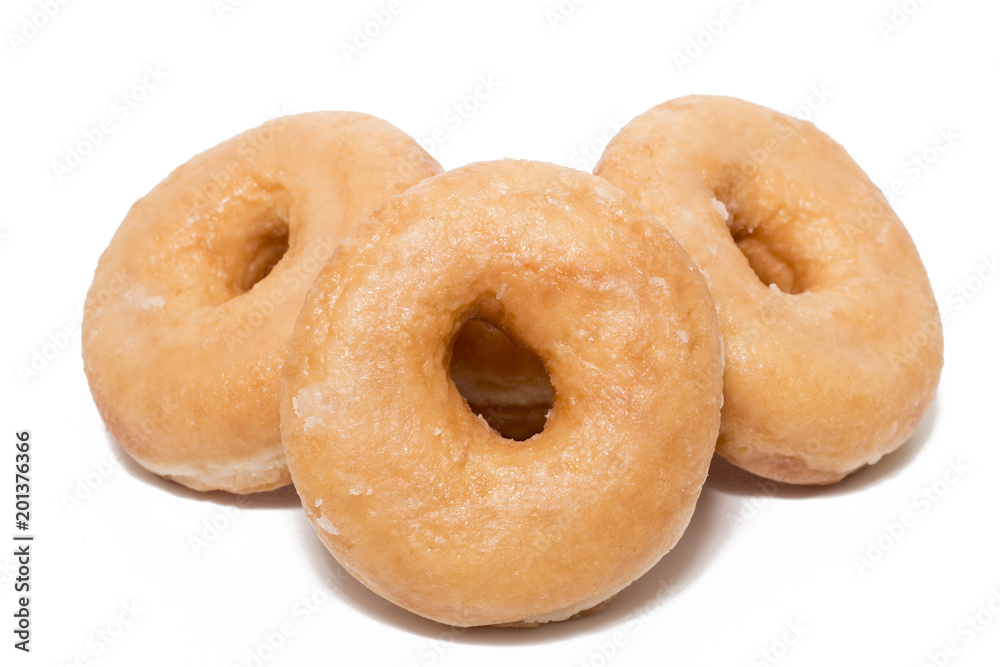 Donuts over white background