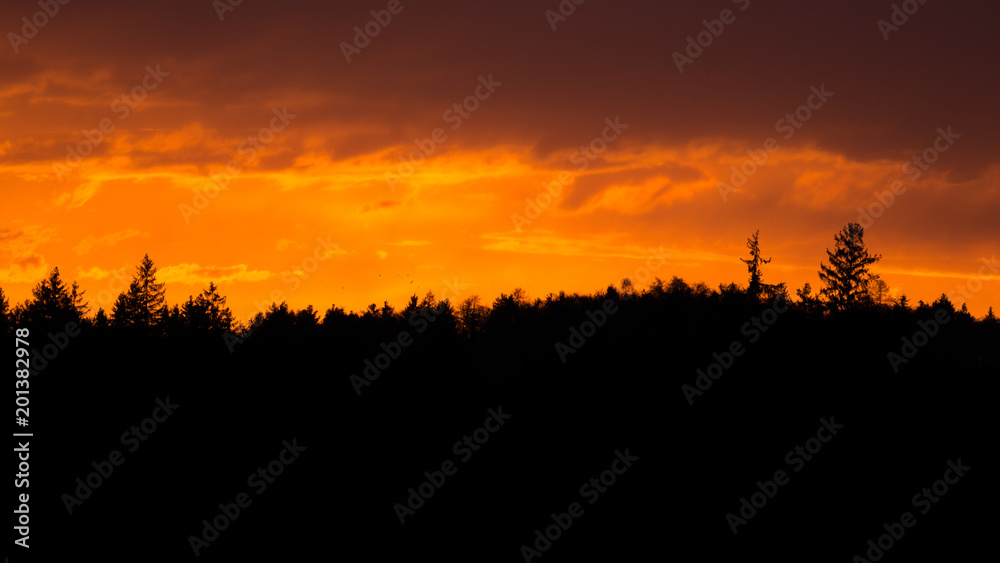 Obraz premium Colorful sunset over the Alps with Sahara Sand in the air