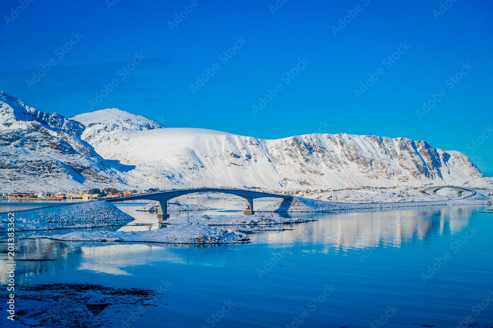 Outdoor view of gimsoystraumen Bridge is a cantilever road bridge that crosses the strait between the islands of Austvagoya and Gimsoya in the municipality of Vagan in Nordland county Outdoor view of gimsoystraumen Bridge is a cantilever road bridge that crosses the strait between the islands of Austvagoya and Gimsoya in the municipality of Vagan in Nordland county
