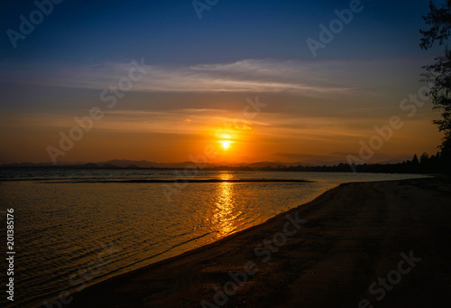 Landscapes of sunset on the beach with colorful sky background.