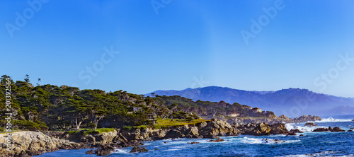 Sunset Point - Pebble Beach, California, February 17, 2018: Beautiful sea and rocky point vista along the 17 Mile Drive south of Cypress Point Golf Course overlooking Sunset Point.