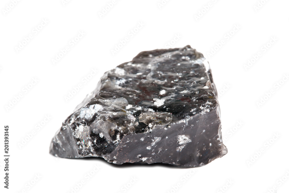 Macro shooting of natural gemstone. The raw mineral is obsidian, Indonesia. Isolated object on a white background. Macro shooting of natural gemstone. The raw mineral is obsidian, Indonesia. Isolated object on a white background.