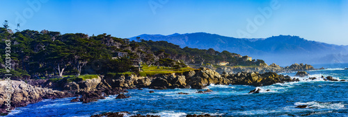 Sunset Point - Pebble Beach, California, February 17, 2018: Beautiful sea and rocky point vista along the 17 Mile Drive south of Cypress Point Golf Course overlooking Sunset Point.