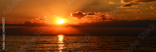 beutiful orange sunset on the calm sea © WeźTylkoSpójrz