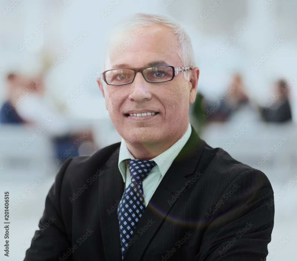 close up portrait of senior businessman in office close up portrait of senior businessman in office