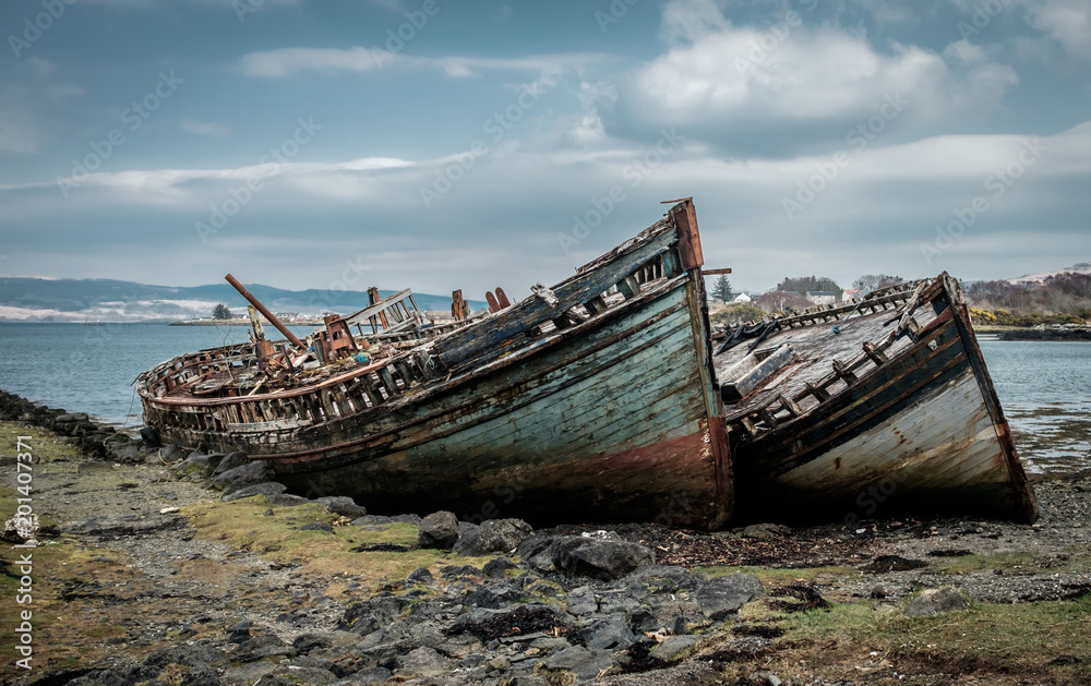 Photograph of two abandoned fishing boats on the Isle of Mull Photograph of two abandoned fishing boats on the Isle of Mull