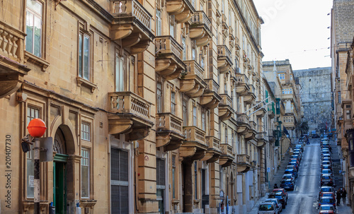 Malta, Valletta, building facade with balconies, perspective view