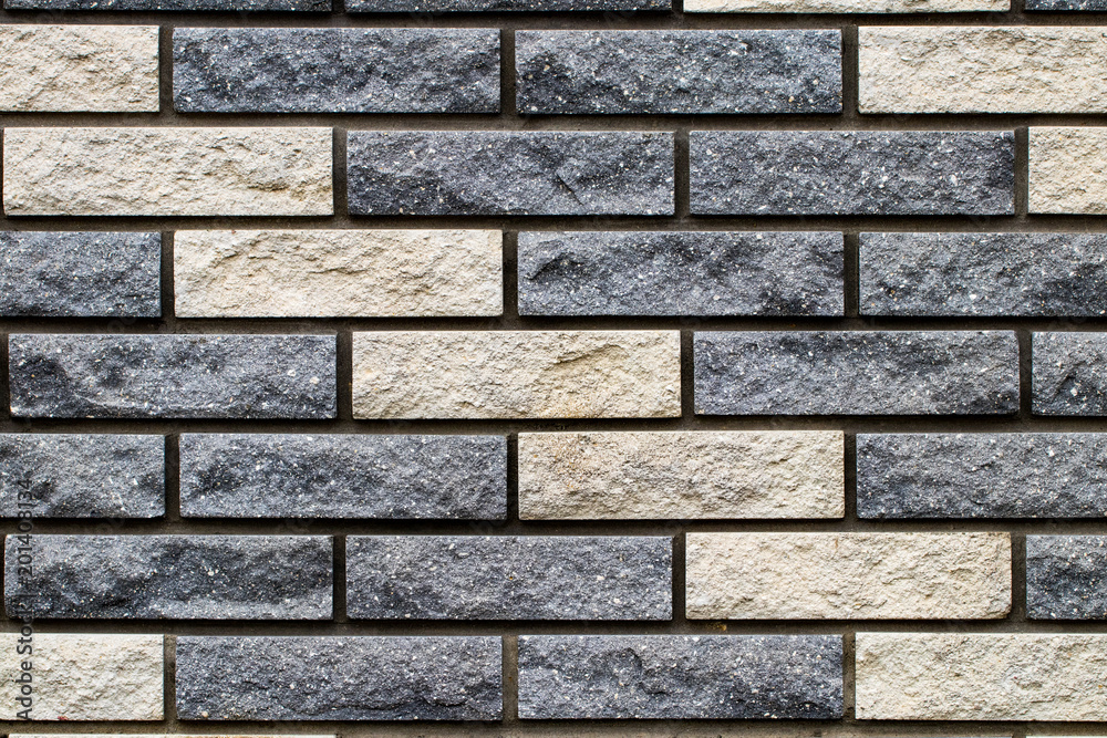 Obraz premium Weathered stained old brick wall background. close-up