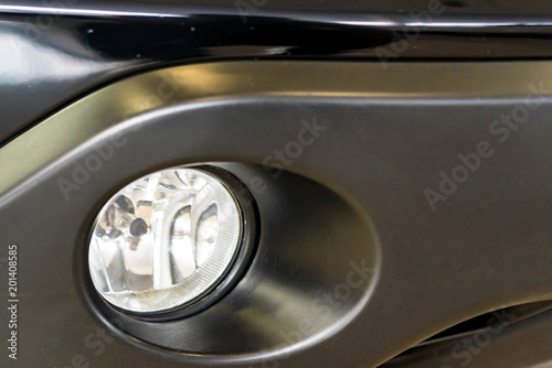 Close-up anti-fog headlight of car