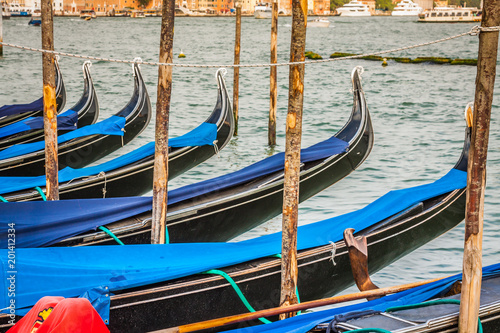 Gondolas moored by Saint Mark square. Venice, Italy, Europe