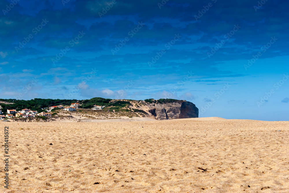 Rest on the sand beach. Summer photo near sea. Beach on Foz do Arelho, Portugal. Rest on the sand beach. Summer photo near sea. Beach on Foz do Arelho, Portugal.