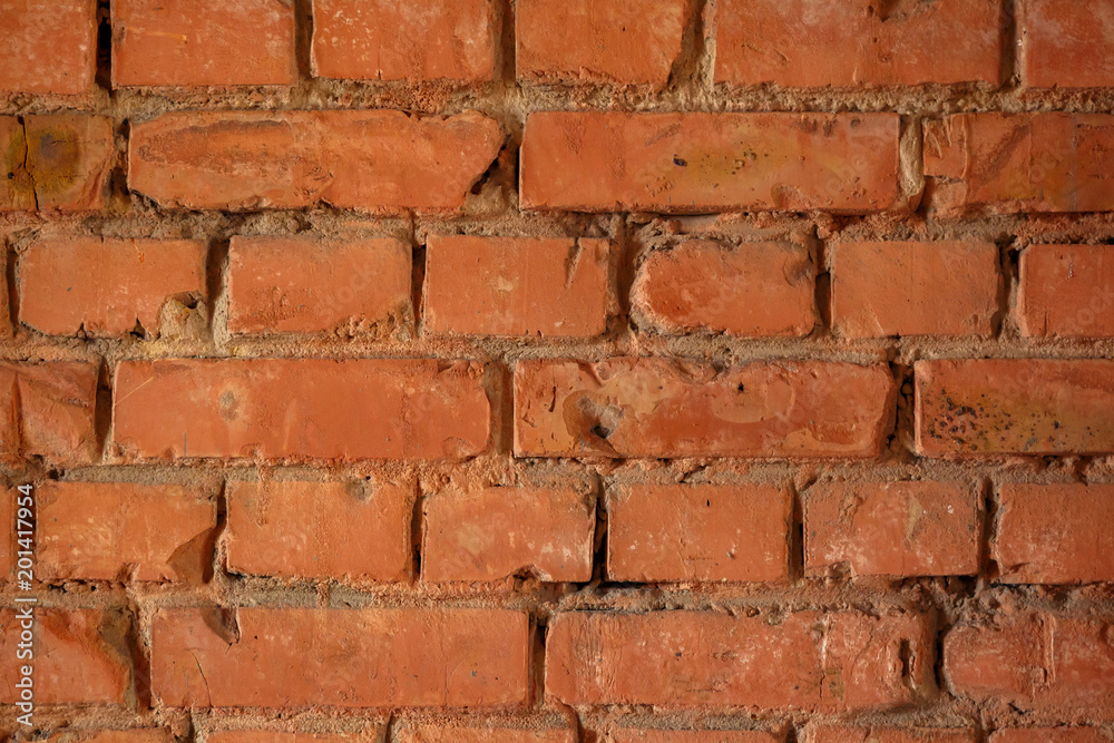 Obraz premium Part of a red brick wall. Texture background. Pattern