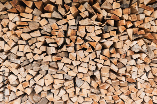 Pile of wood logs. Wood texture background or pattern.