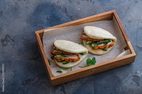 Chinese steamed buns with pork belly, top view, place for wording photo