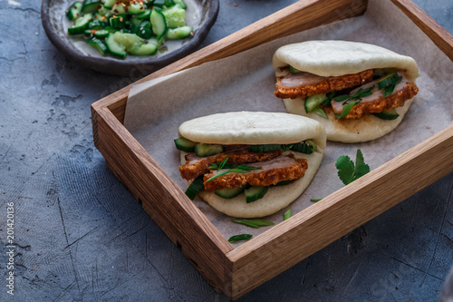 Gua bao, steamed buns, with pork belly, close view photo