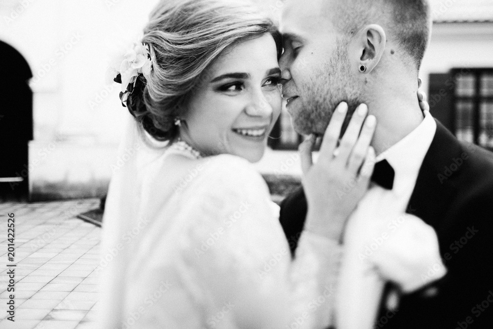 Lovely moment of the young couple in the wedding day Lovely moment of the young couple in the wedding day