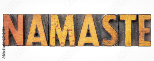 namaste word abstract in wood type photo