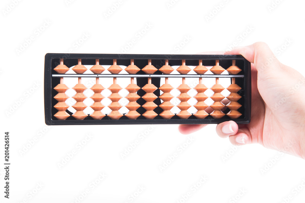 Female hand holding ancient abacus isolated on white