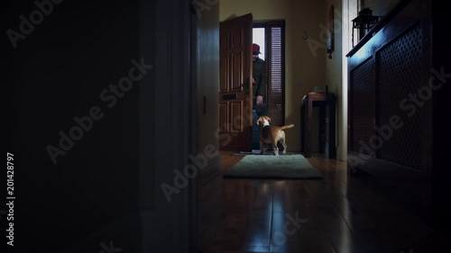 4k Dolly of House Front Door, Dog Waiting for Owner to Come Home