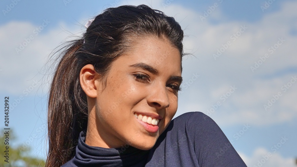 Hispanic Teenager Girl Smiling