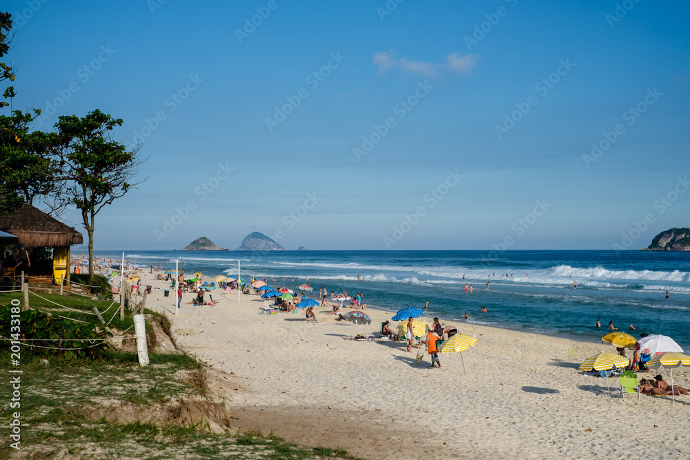 Barra da Tijuca beach on a beatiful afternoon, with Tijucas Islands in the background. Rio de Janeiro