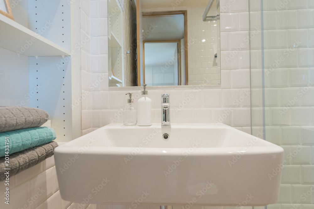 Fototapeta premium Bathroom interior with sink and faucet.