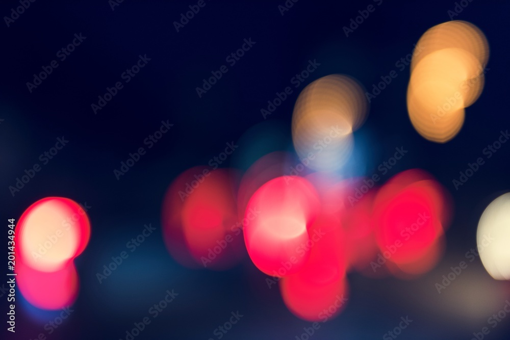 Fototapeta premium Blurred street bokeh lights at night time