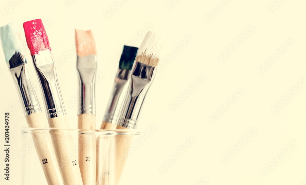 Fototapeta premium Paintbrush Art Tool in a Transparent Glass