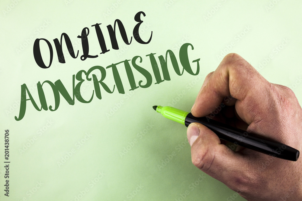 Text sign showing Online Advertising. Conceptual photo website campaigns Ads electronic marketing SEO Reaching written by Man holding Marker in Hand on plain background. Text sign showing Online Advertising. Conceptual photo website campaigns Ads electronic marketing SEO Reaching written by Man holding Marker in Hand on plain background.