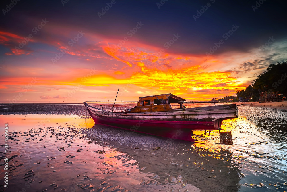 The Sunset Behind a Boat