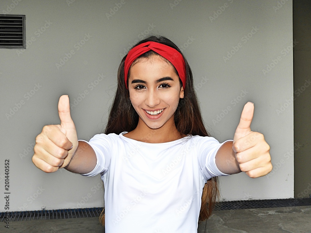 Cute Teenage Female With Thumbs Up Cute Teenage Female With Thumbs Up