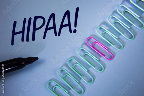 Word writing text Hipaa Motivational Call. Business concept for Health Insurance Portability and Accountability Act written on Plain Blue background Paper Clips and Marker next to it.