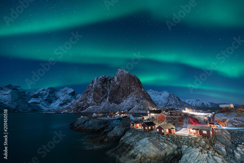 Fisherman village with Aurora in the background / travel concept world explore northern light