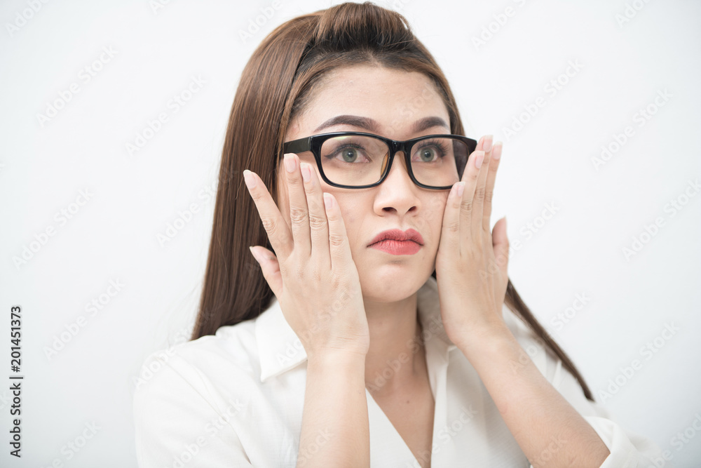 A young woman checking wrinkles on her face, Skin problem. A young woman checking wrinkles on her face, Skin problem.