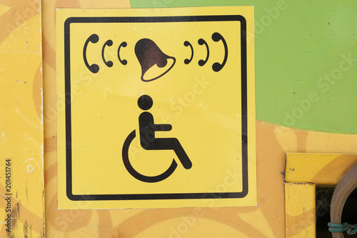 yellow sign Board for people with disabilities photo