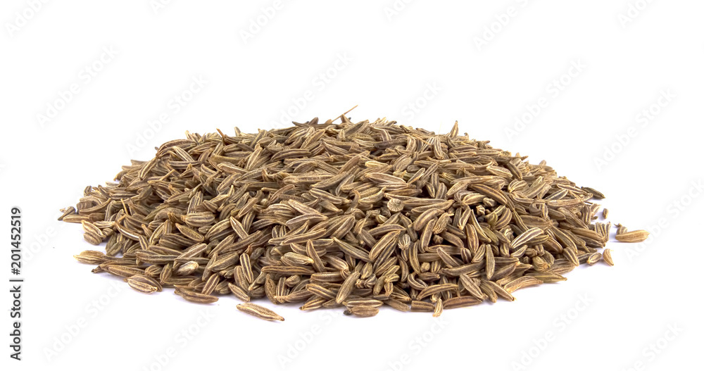 Cumin seeds or caraway isolated on white background