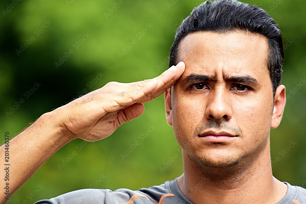 Obraz premium Civilian Adult Hispanic Male Saluting