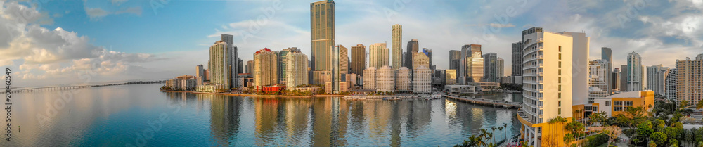 Panoramic aerial view of Downtown Miami and Brickell Key at sunrise